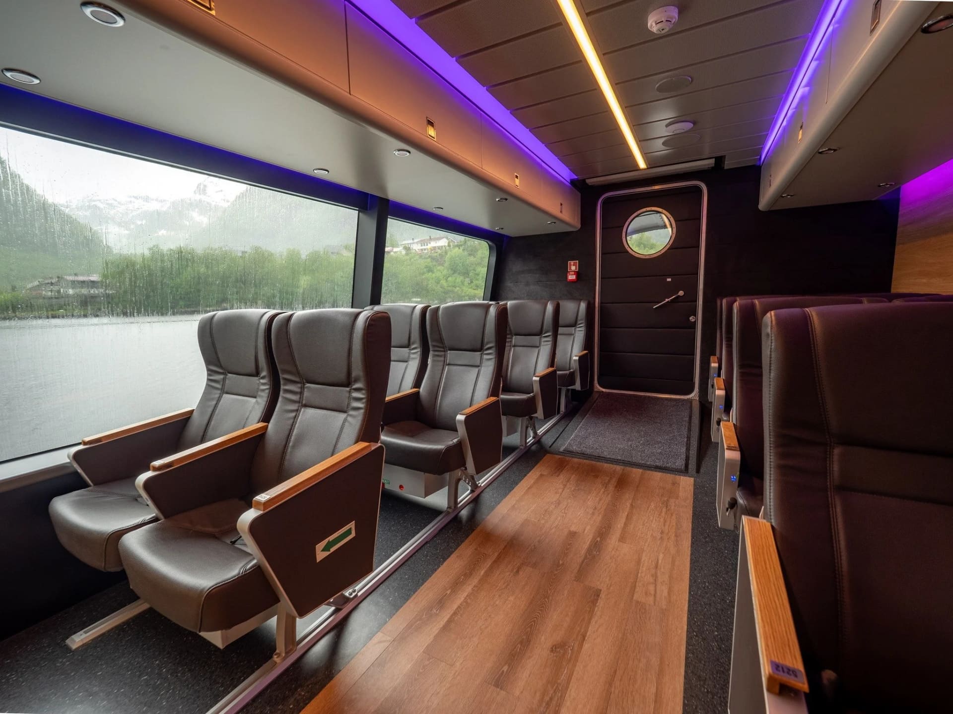 High-back passenger seats with ambient lighting on OBLUE AERO 36