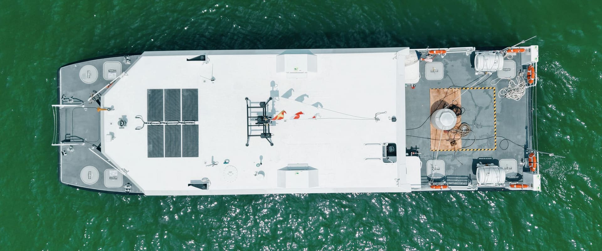 Top view of the OBLUE E60 under way, solar array on the roof