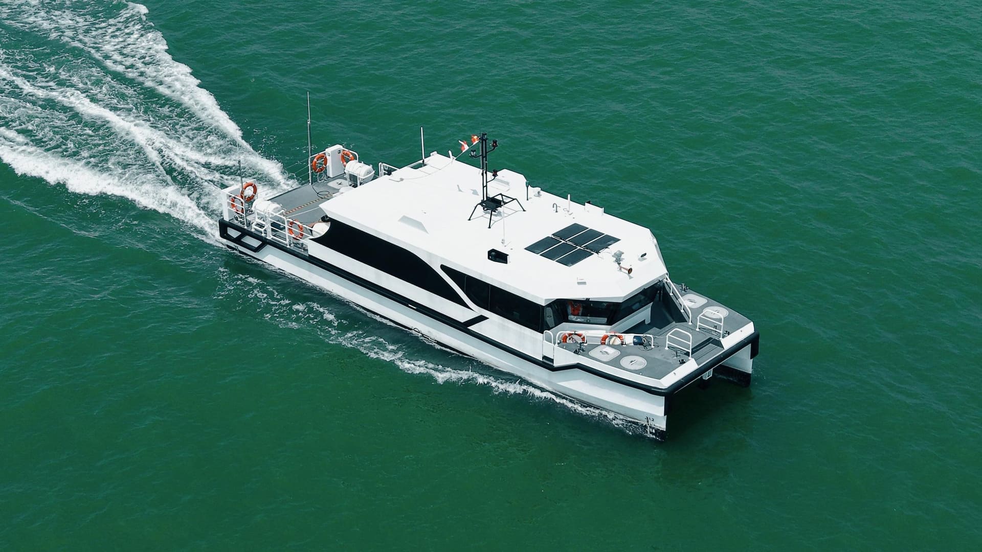 OBLUE E60 electric catamaran running at speed