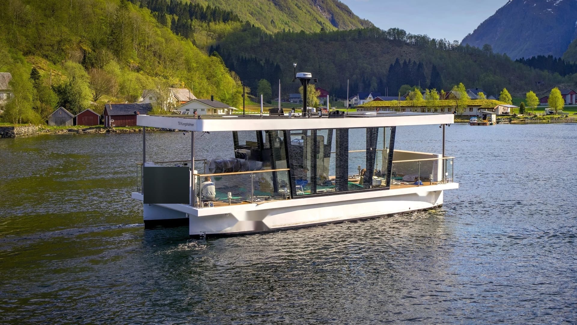 OBLUE FERRY 12E cruising a Norwegian fjord