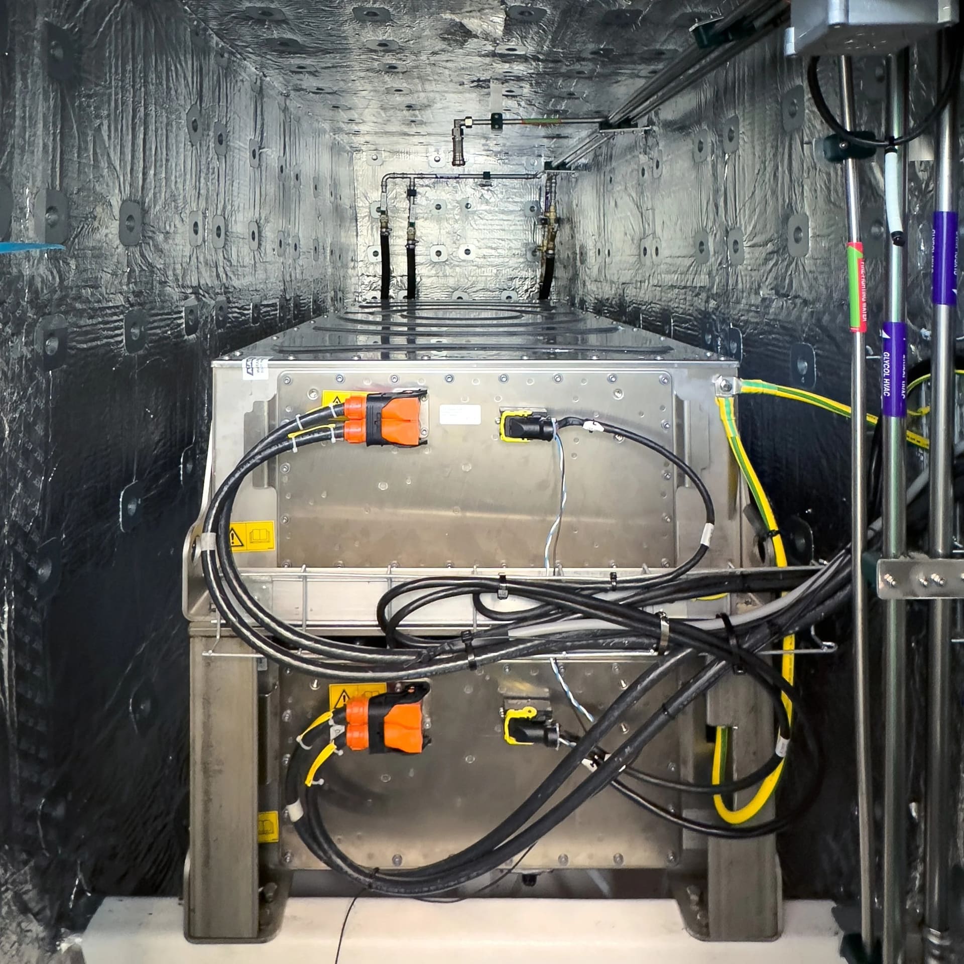 Electrical machinery space inside a carbon demi-hull of the OBLUE FERRY 12E