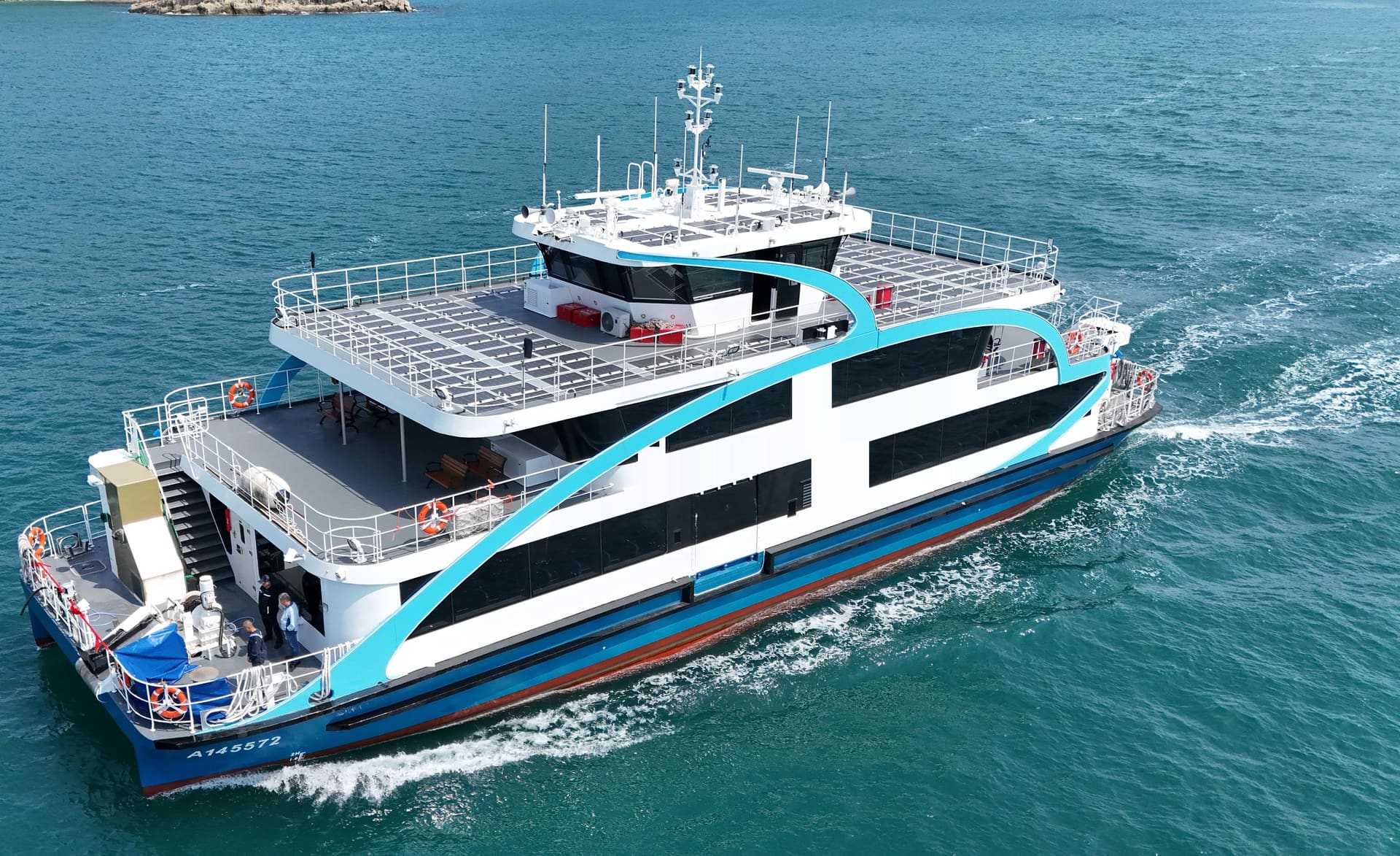 OBLUE FERRY 35E all-electric carbon fiber ferry underway in Hong Kong, aerial view