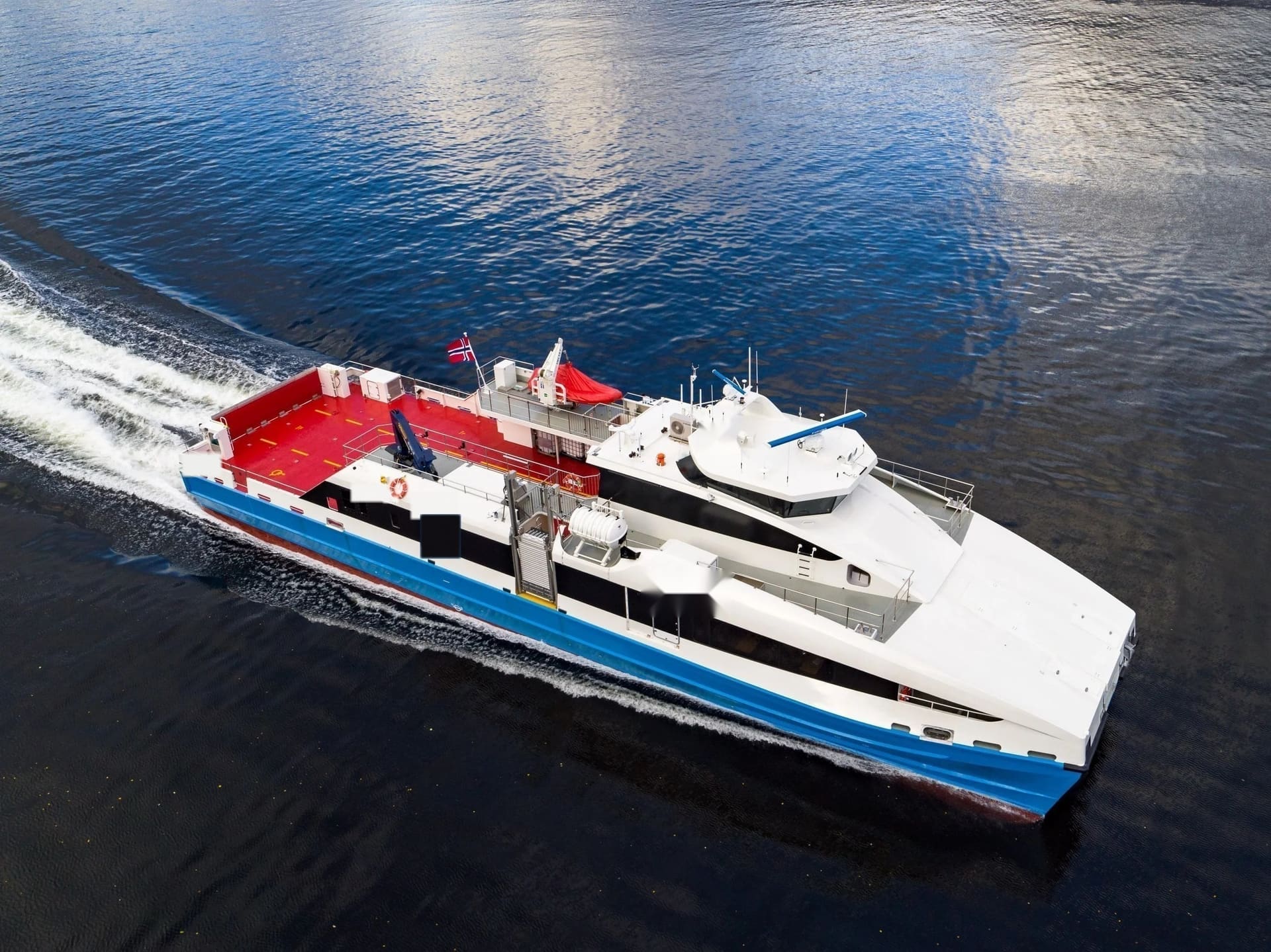 FERRY 37 underway at speed, bow aerial view
