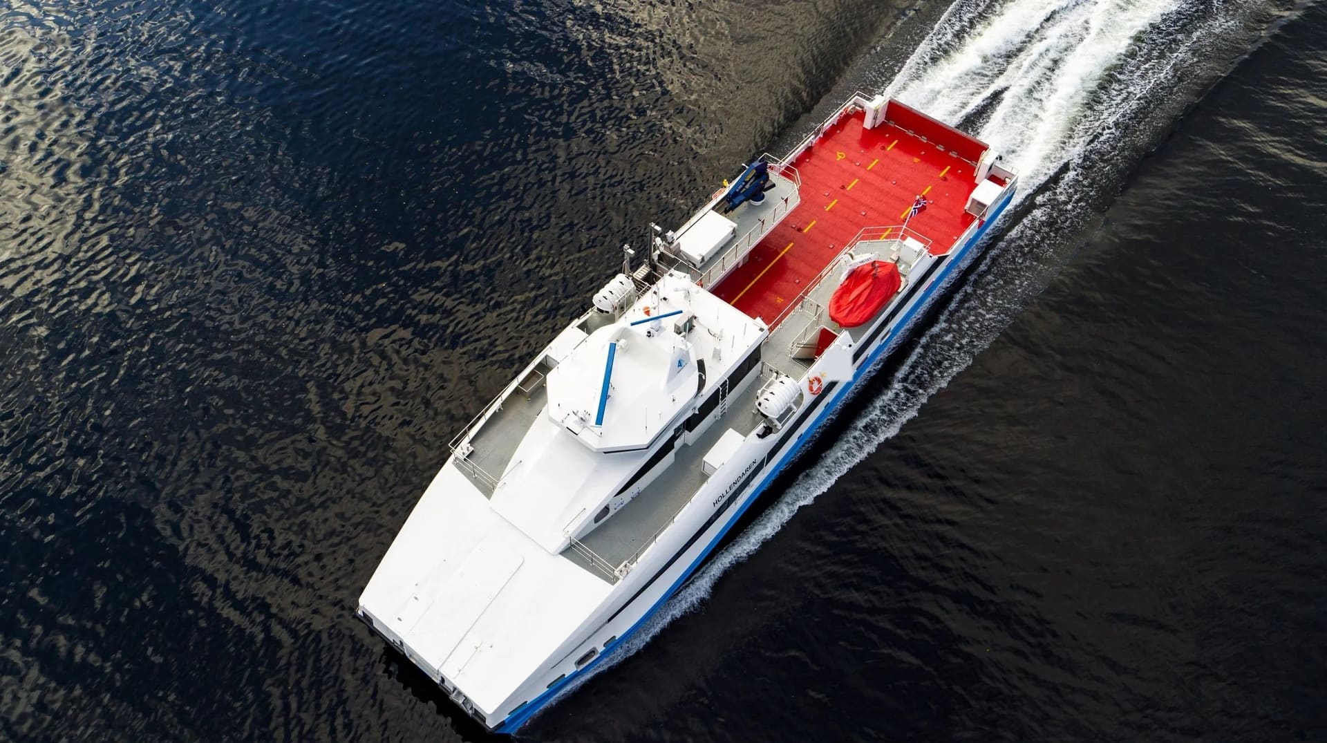 Aerial view of the FERRY 37 underway, car deck in red