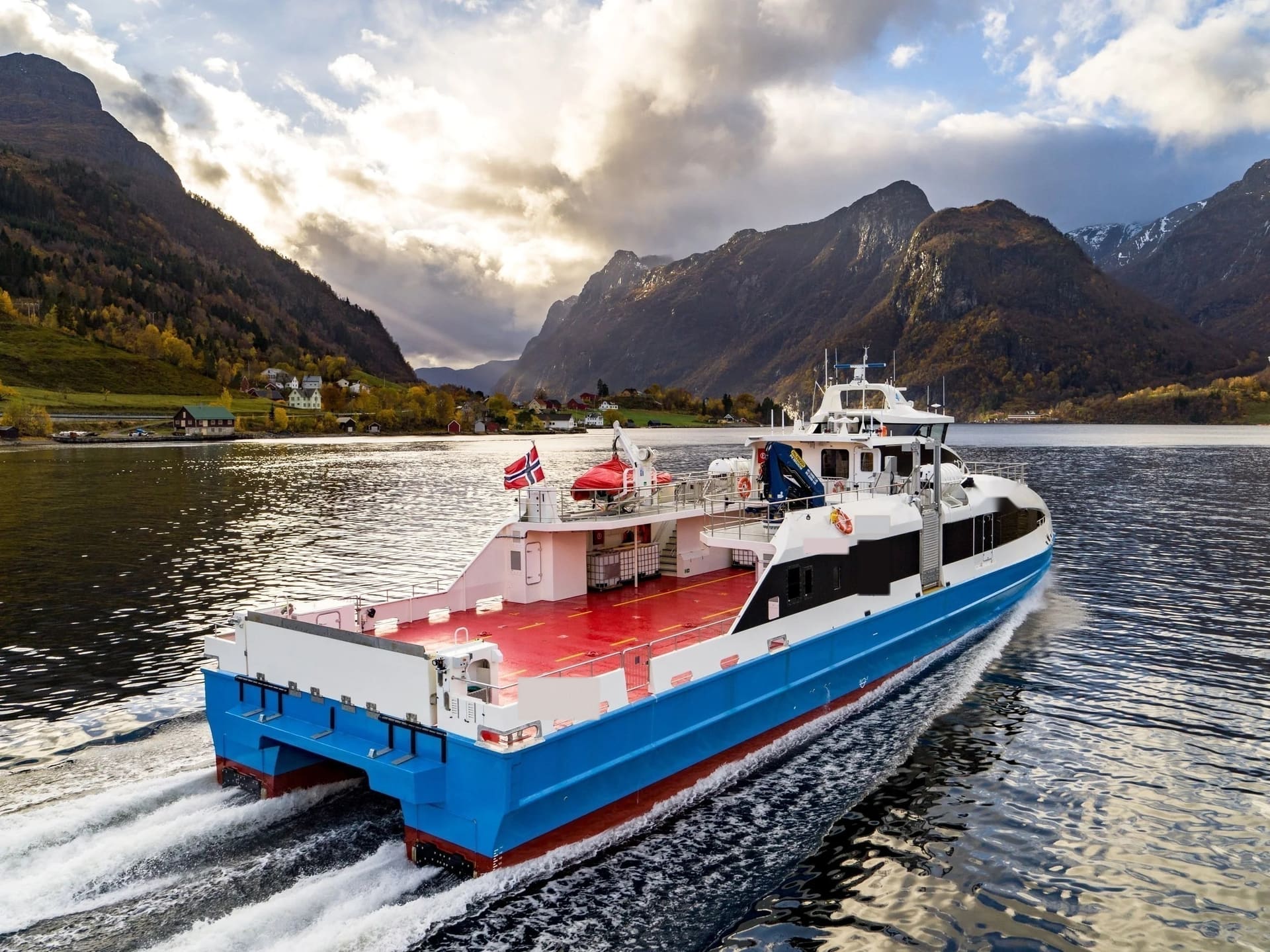 FERRY 37 stern quarter view with the open red car deck