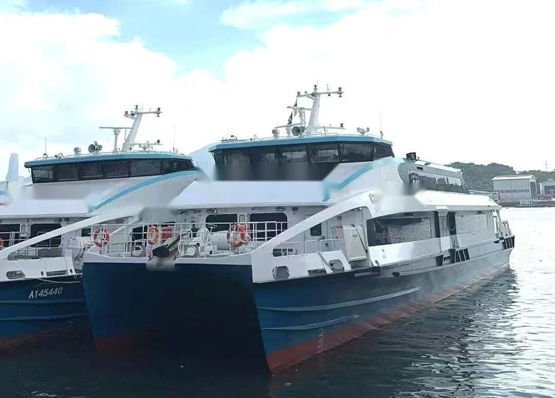 The OBLUE FERRY 45 at handover alongside a sister ship of the outlying-islands batch, bow view