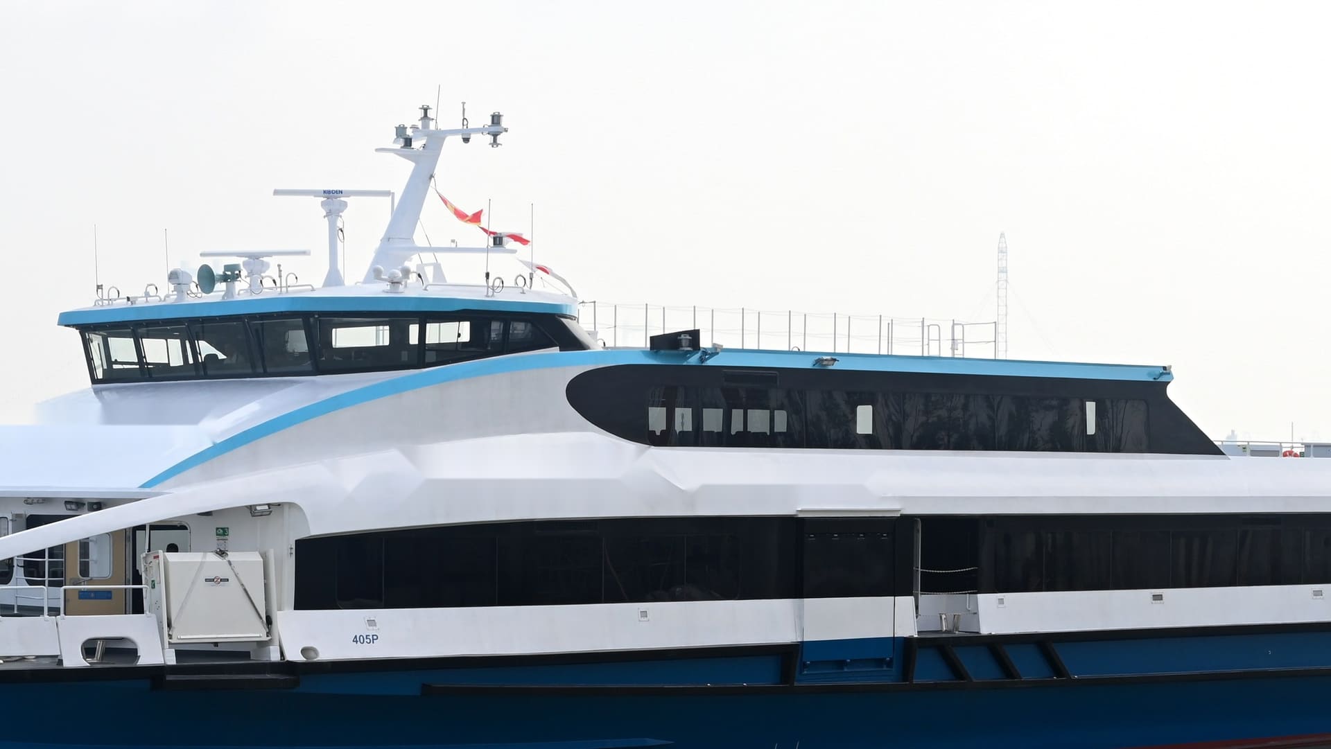 Wheelhouse and mast of the OBLUE FERRY 45 with radar and navigation suite