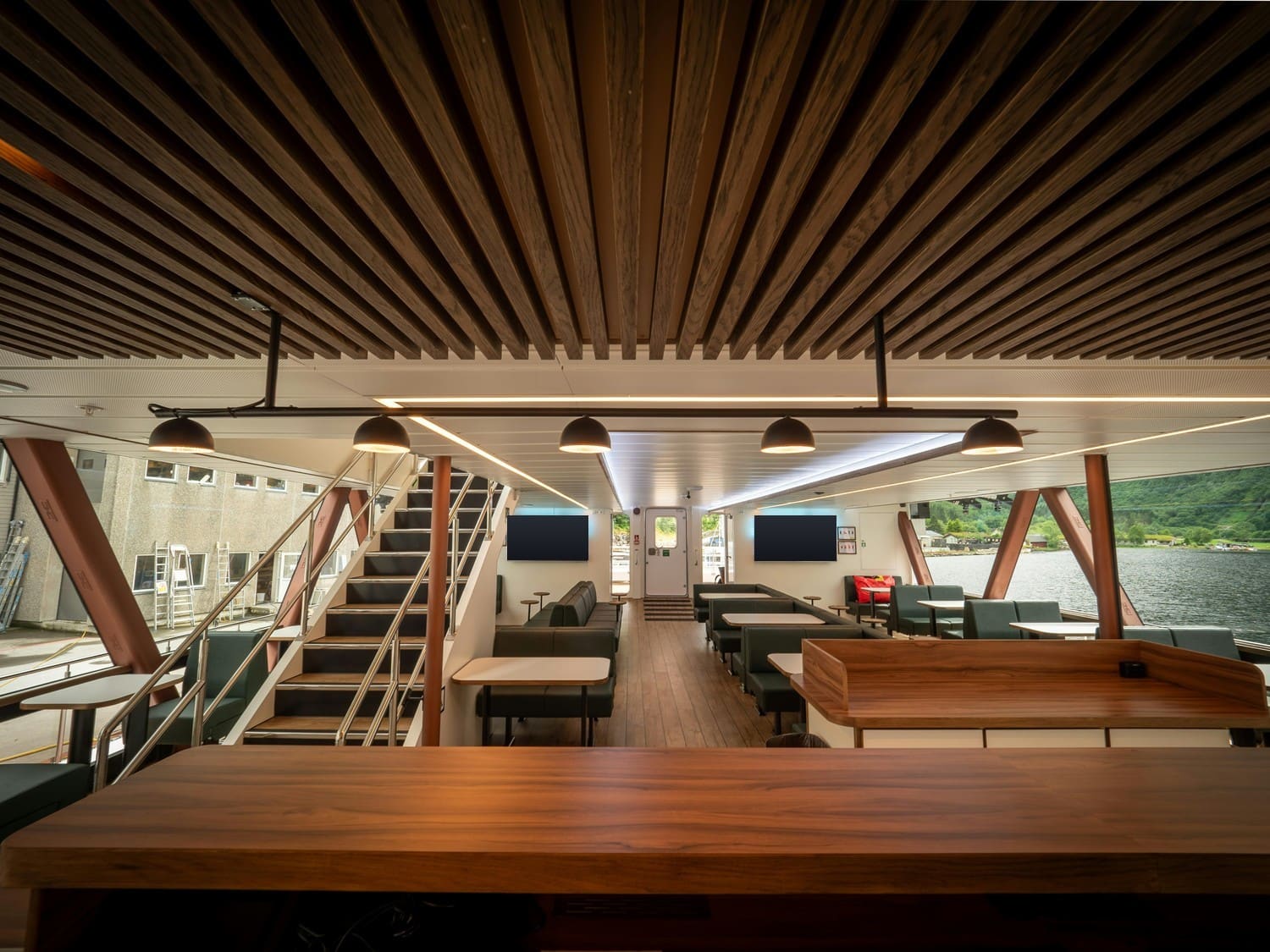 Second-deck saloon of the SEASIGHT 26 with wooden ceiling