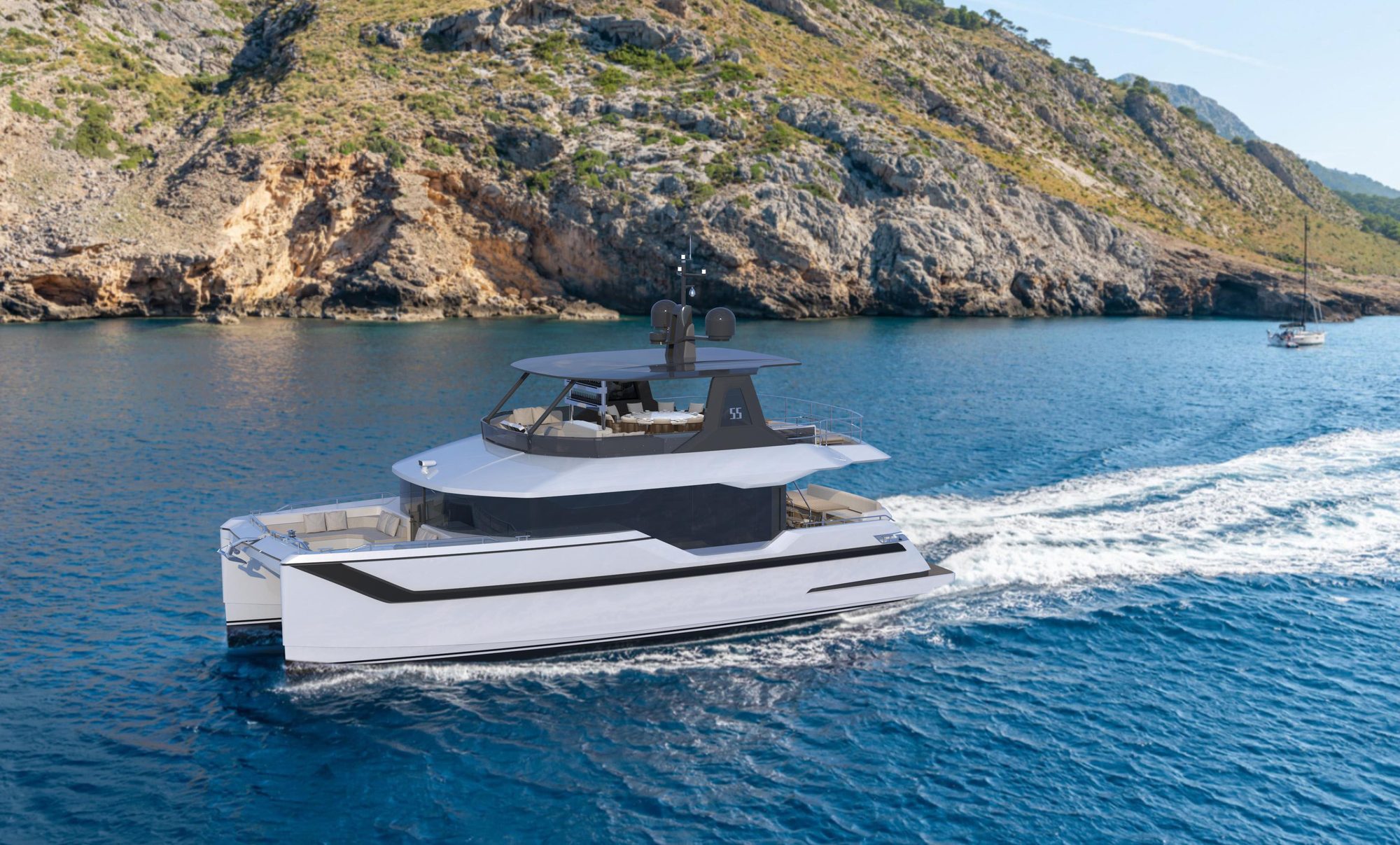 OBLUE 55FT catamaran cruising along a rocky coastline